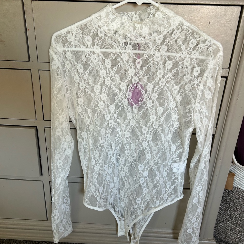 Chic White Bodysuit with Sleek Design